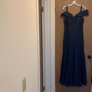 Shimmering Navy blue evening gown and sheer wrap.